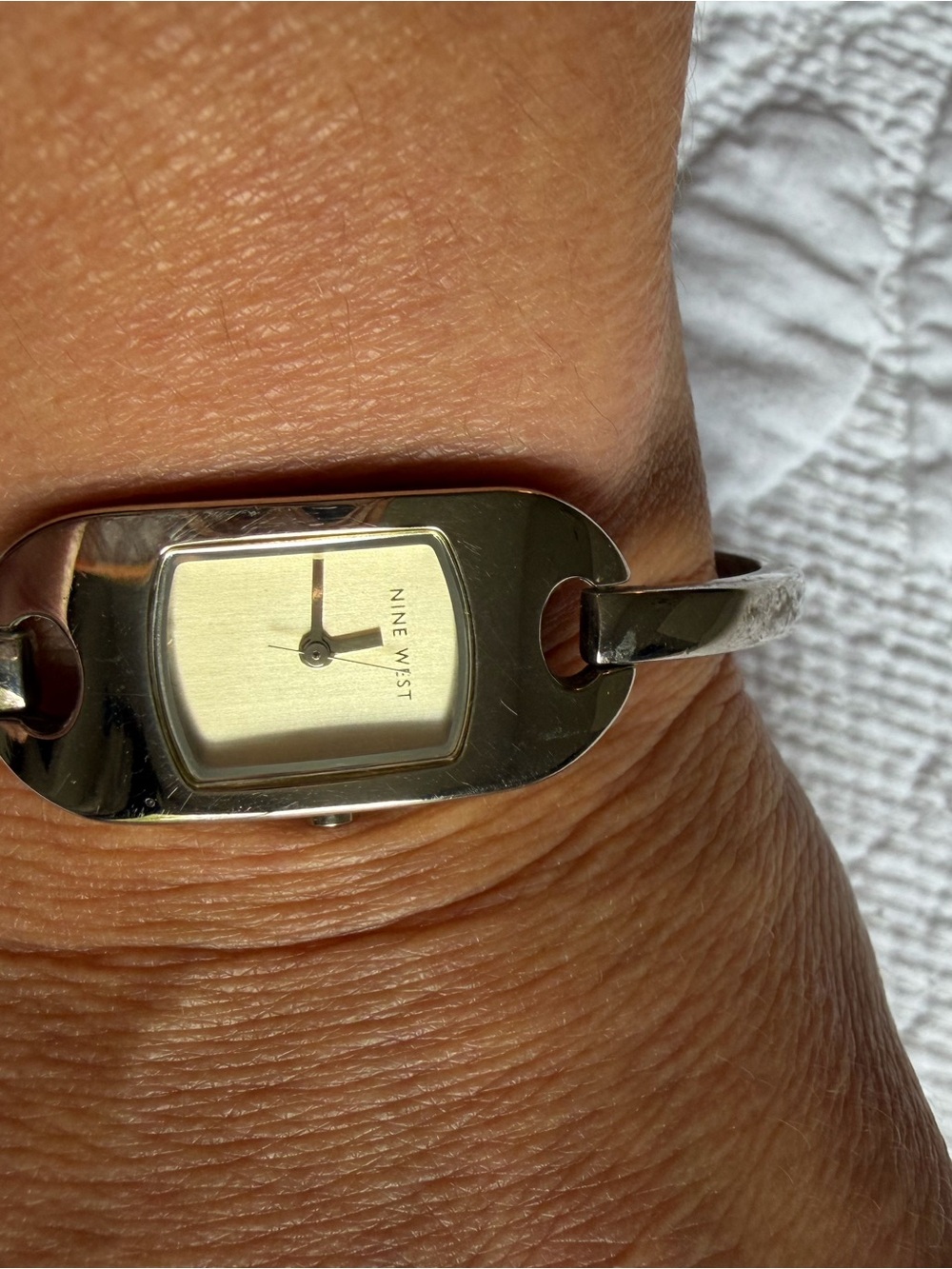 Nine West Silver Tone Bangle Watch with Champagne Dial
